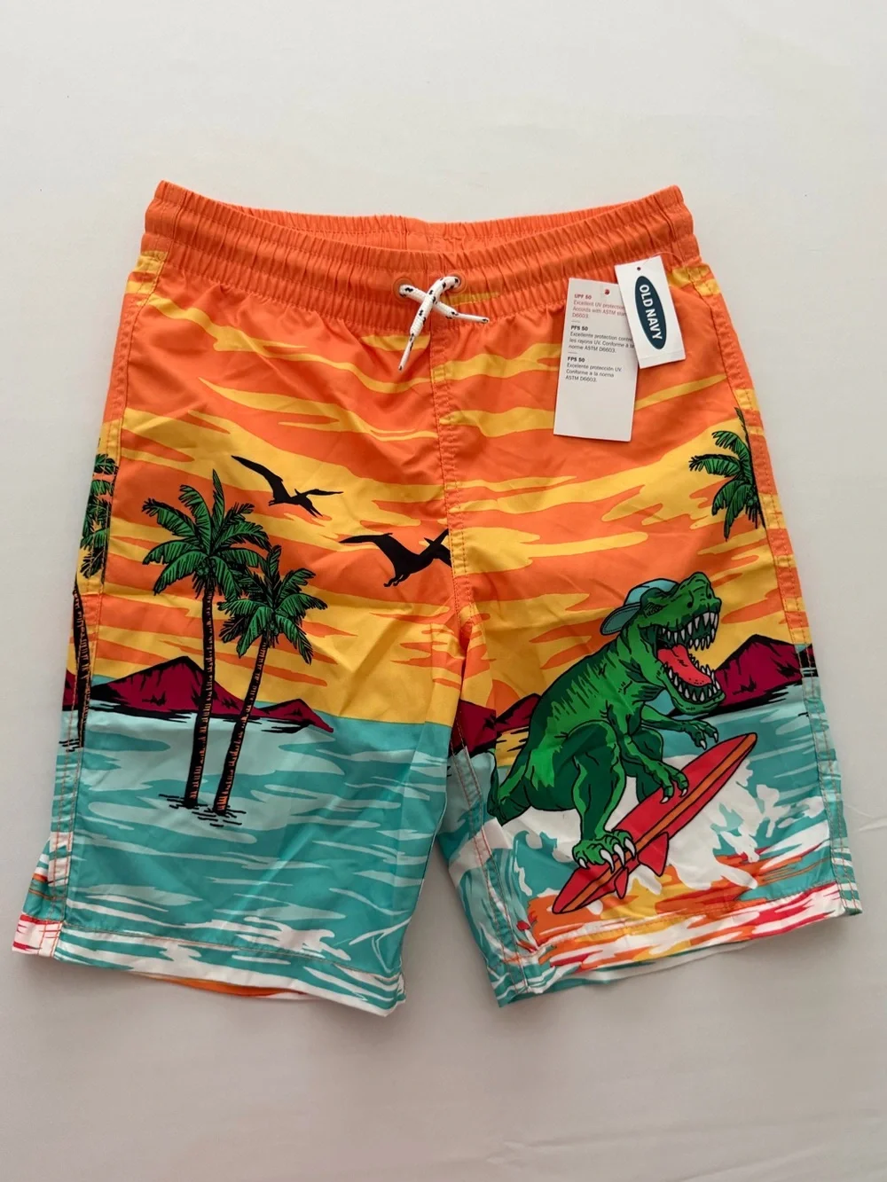 (NWT) Old Navy Boy’s Dinosaur 🦖 Swim Trunks in Orange/Multi, Large (10/12)